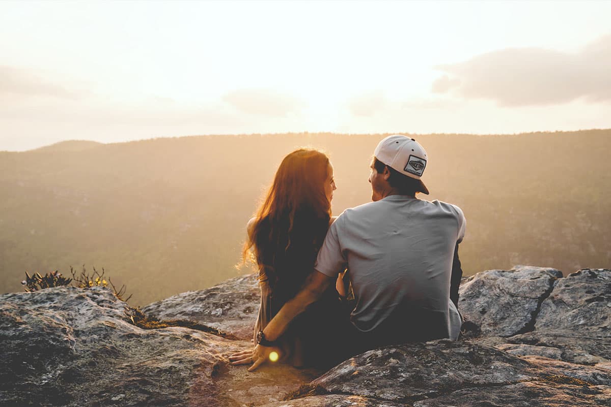 A couple enjoys a sunset