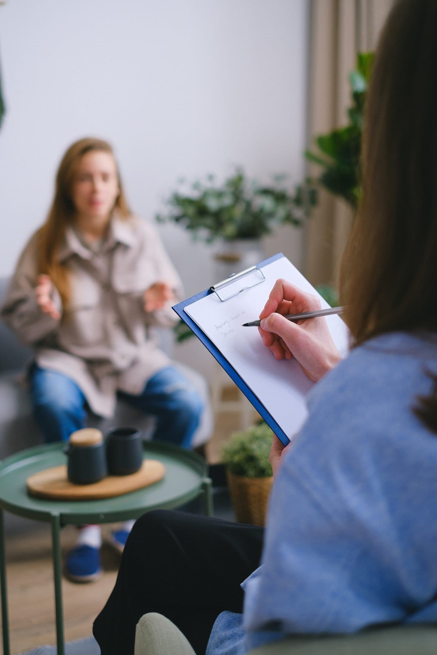 A counseling services page with a woman seated by a window on the right and a list of counseling options on the left