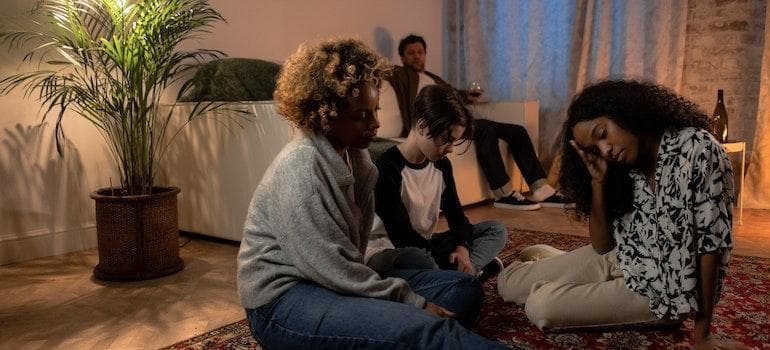 Unhappy family in their living room.