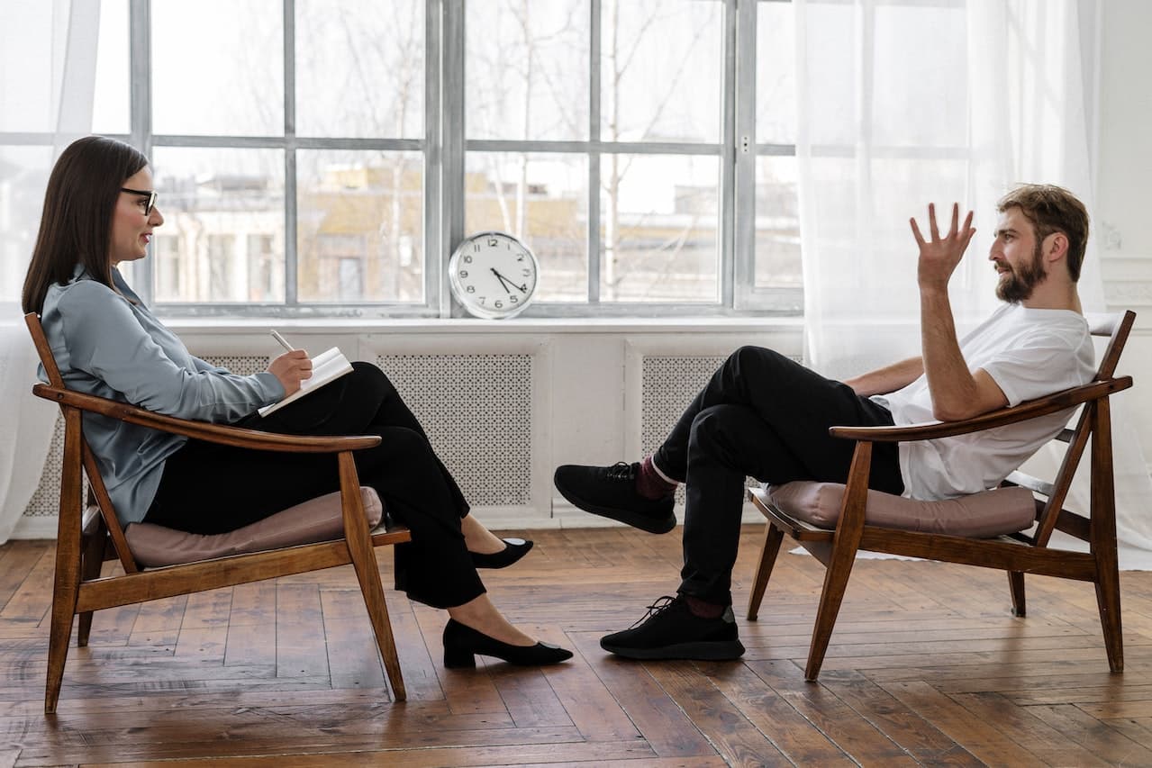 man talking to his counselor