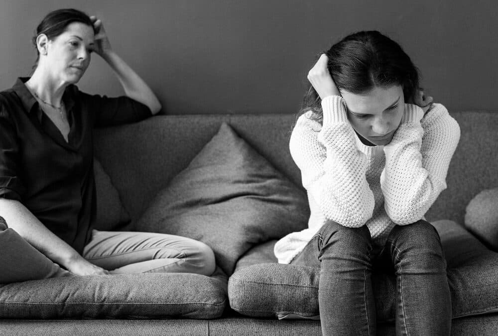 Woman trying to spot the early signs of substance abuse in a family member