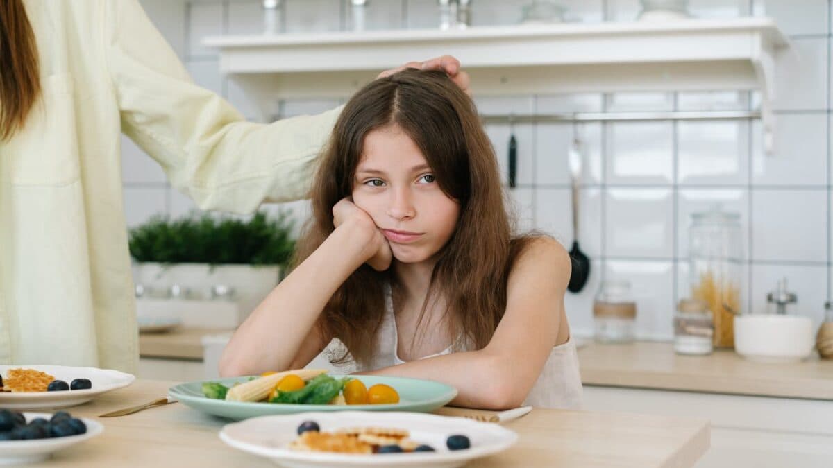 Young girl upset at her mom