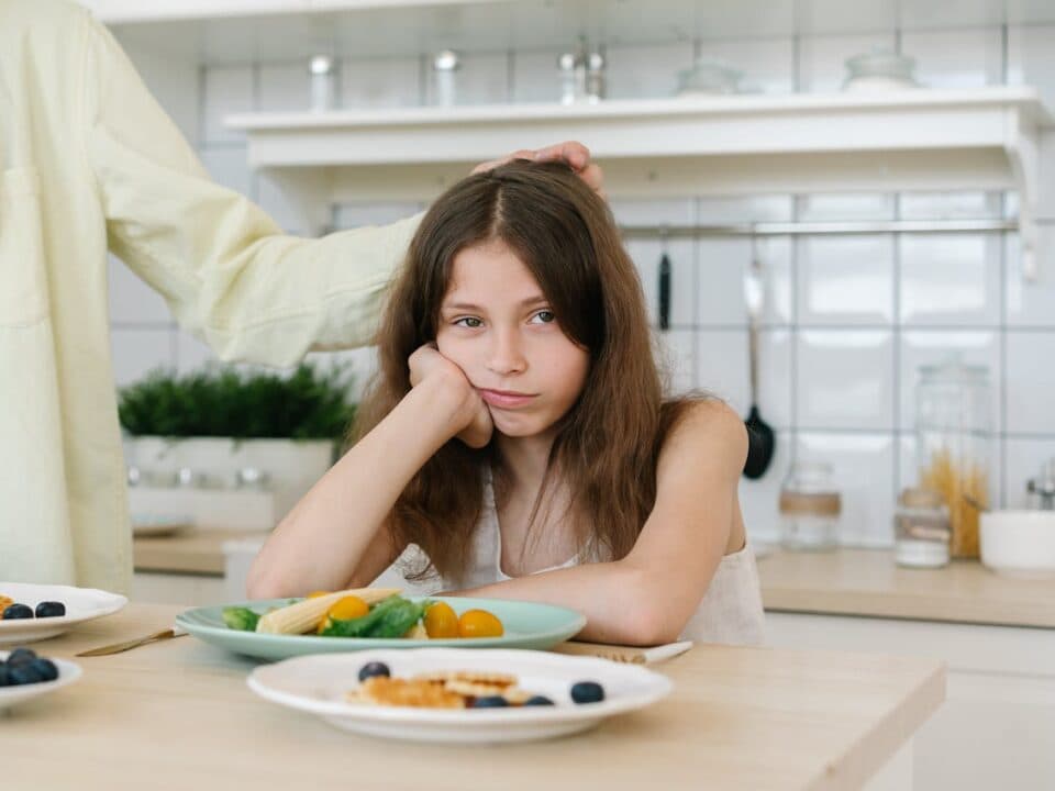 Young girl upset at her mom